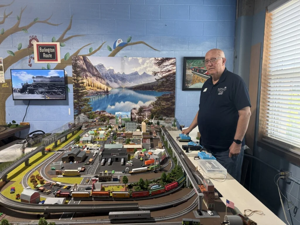 Paul Prell with his model train layout at Oak Trace senior living community in Downers Grove